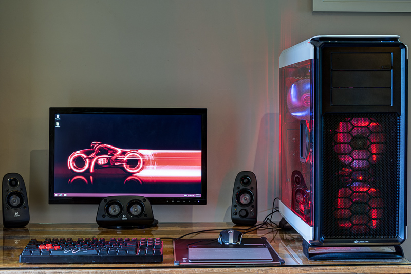 Monitor, speakers, keyboard, mouse, stylus and desktop computer with red LED theme